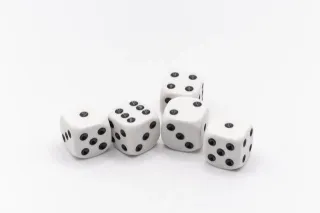 What is dice? How is it different from dice games?